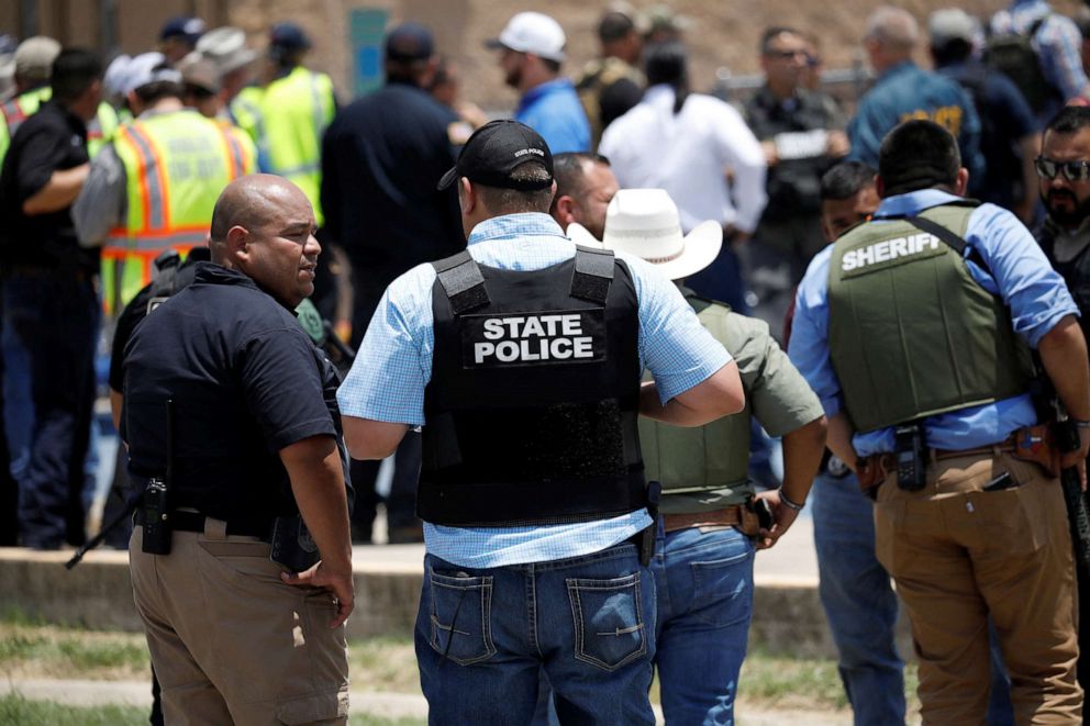 PHOTO: Law enforcement personnel guard the scene near Robb Elementary School in Uvalde, Texas, May 24, 2022.