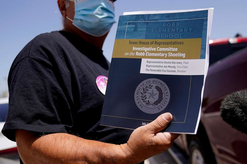 PHOTO: Vincent Salazar, grandfather of Layla Salazar who was killed in the school shooting at Robb Elementary, holds a report released by the Texas House investigative committee on the shootings at Robb Elementary School in Uvalde, Texas, July 17, 2022.