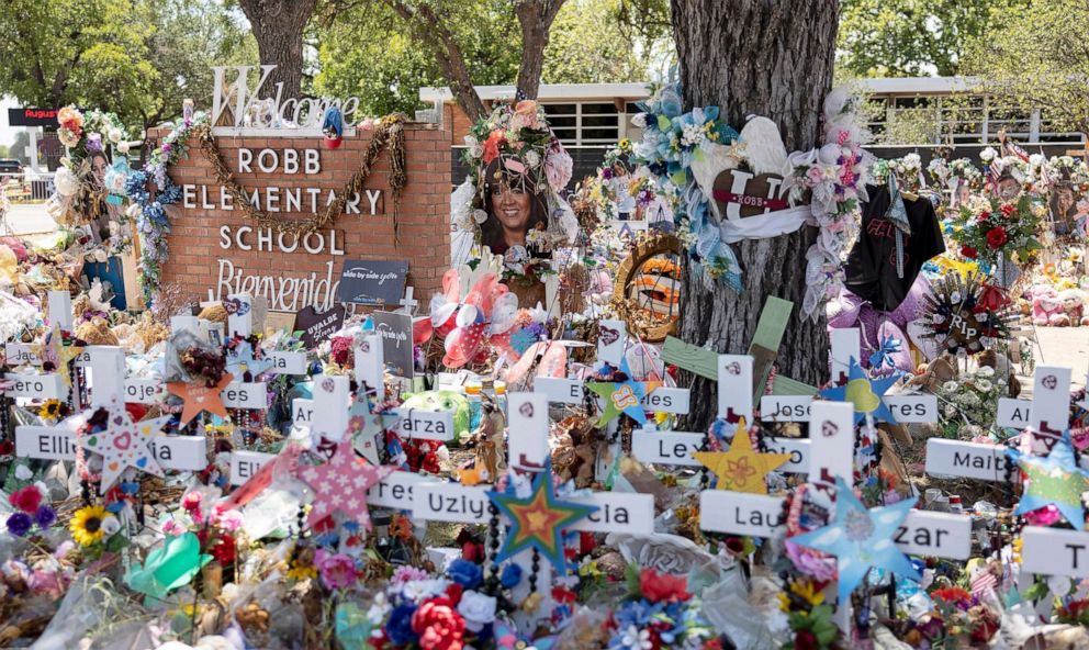 PHOTO: A makeshift memorial site for the victims stands outside Robb Elementary School in Uvalde, Texas, on August 8, 2022.