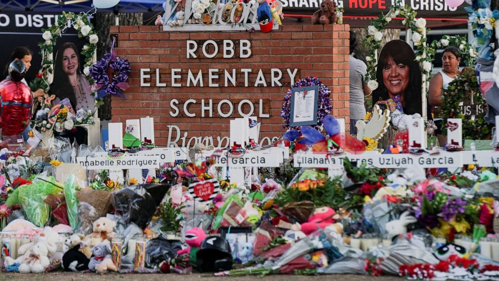 PHOTO: Flowers, toys, and other objects are seen at a memorial for the victims of the deadliest mass shooting in nearly a decade resulting in the death of 19 children and two teachers at Robb Elementary School in Uvalde, Texas, May 29, 2022. 