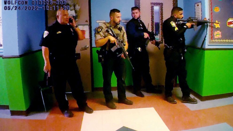 PHOTO: Police deploy in a hallway after Salvador Ramos entered Robb Elementary school in Uvalde, Texas, May 24, 2022 in a still image from police body camera video. 