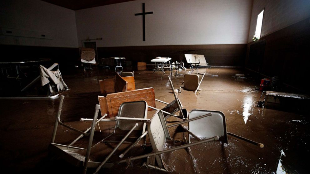 PHOTO: Chairs and pews lie in mud at Baptist Bible Church, July 14, 2022 in Whitewood, Va., following a flash flood.