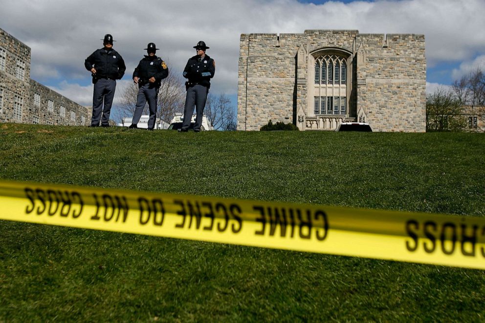  Virginia State Police stand guard outside Norris Hall, where 31 people were shot and killed a day earlier on the campus of Virginia Tech, April 17, 2007 in Blacksburg, Va.					