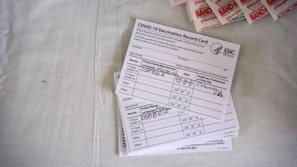 FILE PHOTO: Vaccination cards are pictured at a rural coronavirus disease (COVID-19) vaccination site in Columbus, New Mexico, U.S., April 16, 2021.  REUTERS/Paul Ratje/File Photo