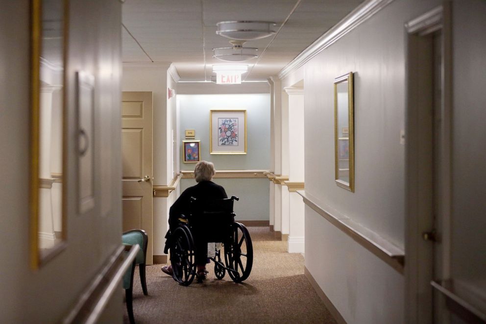 PHOTO: A resident in a wheelchair at an assisted living facility in Boston on Sept. 02, 2020. 