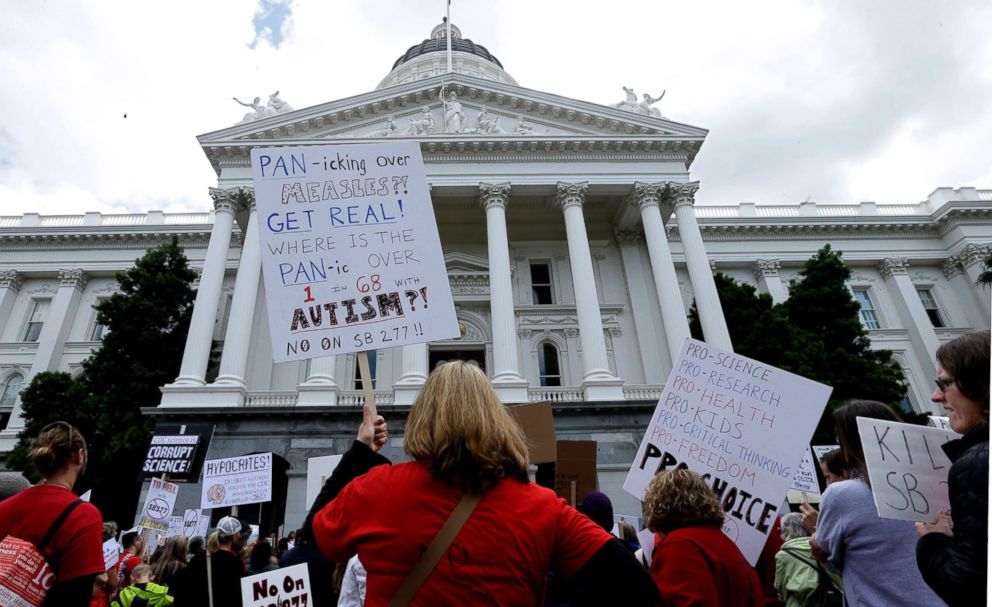 PHOTO: Demonstrators protest against a measure requiring California schoolchildren to get vaccinated, at a rally in Sacramento, Calif., April 8, 2015. 