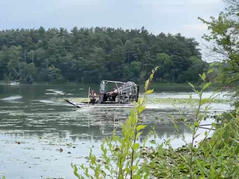 PHOTO: Rescue and recovery teams search Lake Vadnais in Minnesota for the body of a child and the mother after the bodies of two other children were found, July 2, 2022.