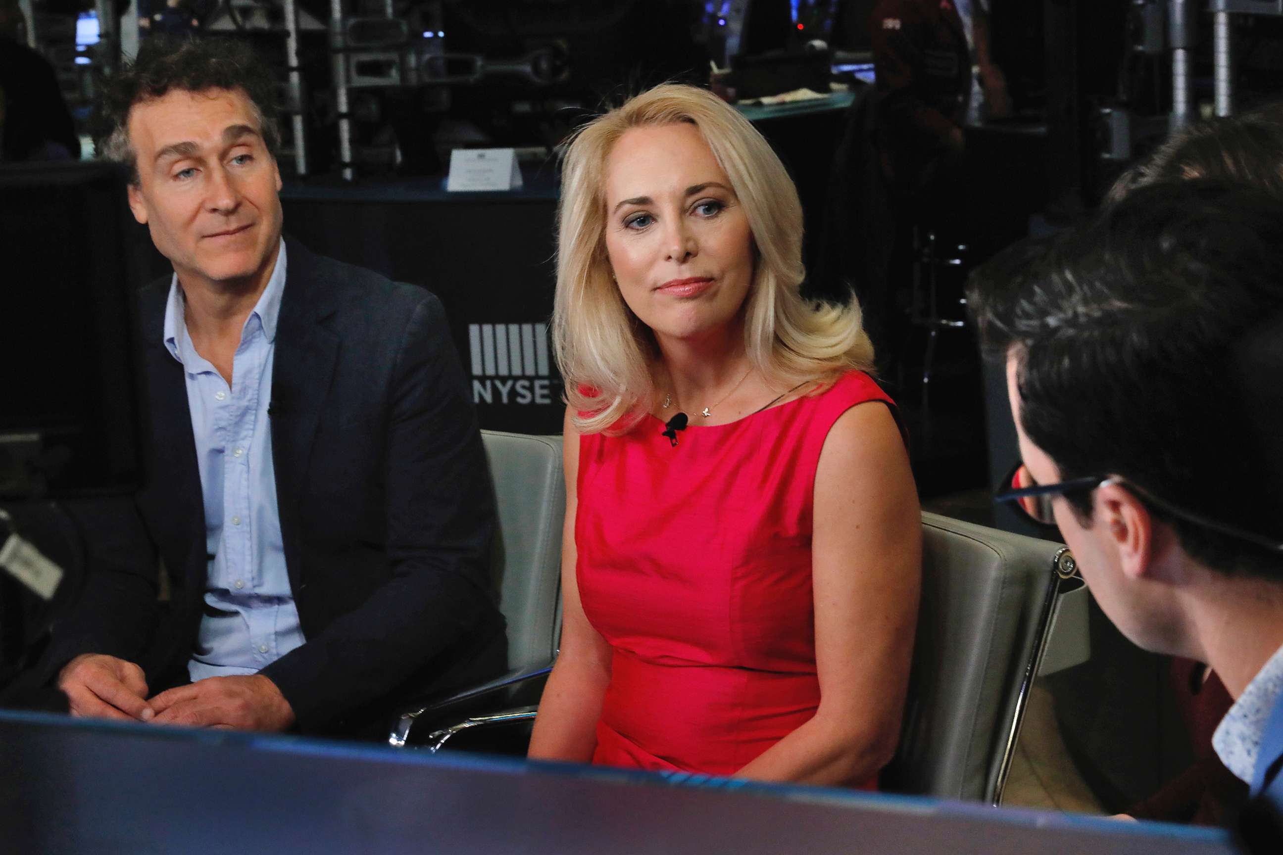 PHOTO: Film director Doug Liman, left, and former undercover CIA officer Valerie Plame are interviewed on Cheddar, on the floor of the New York Stock Exchange, Oct. 22, 2018.
