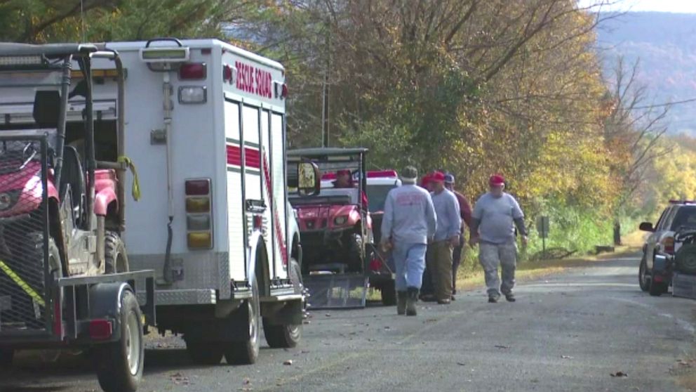 PHOTO: First responders assist on a scene where a 21-year-old college student was found dead after a rappelling accident at the Valhalla Cave in Jackson County, Alabama.