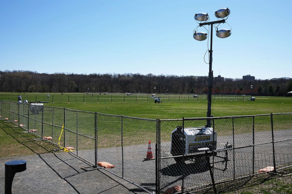 PHOTO: Generators and fences are set up at the future site of a field hospital for coronavirus patients inside Van Cortlandt Park, April 6, 2020 in the Bronx borough of New York City.