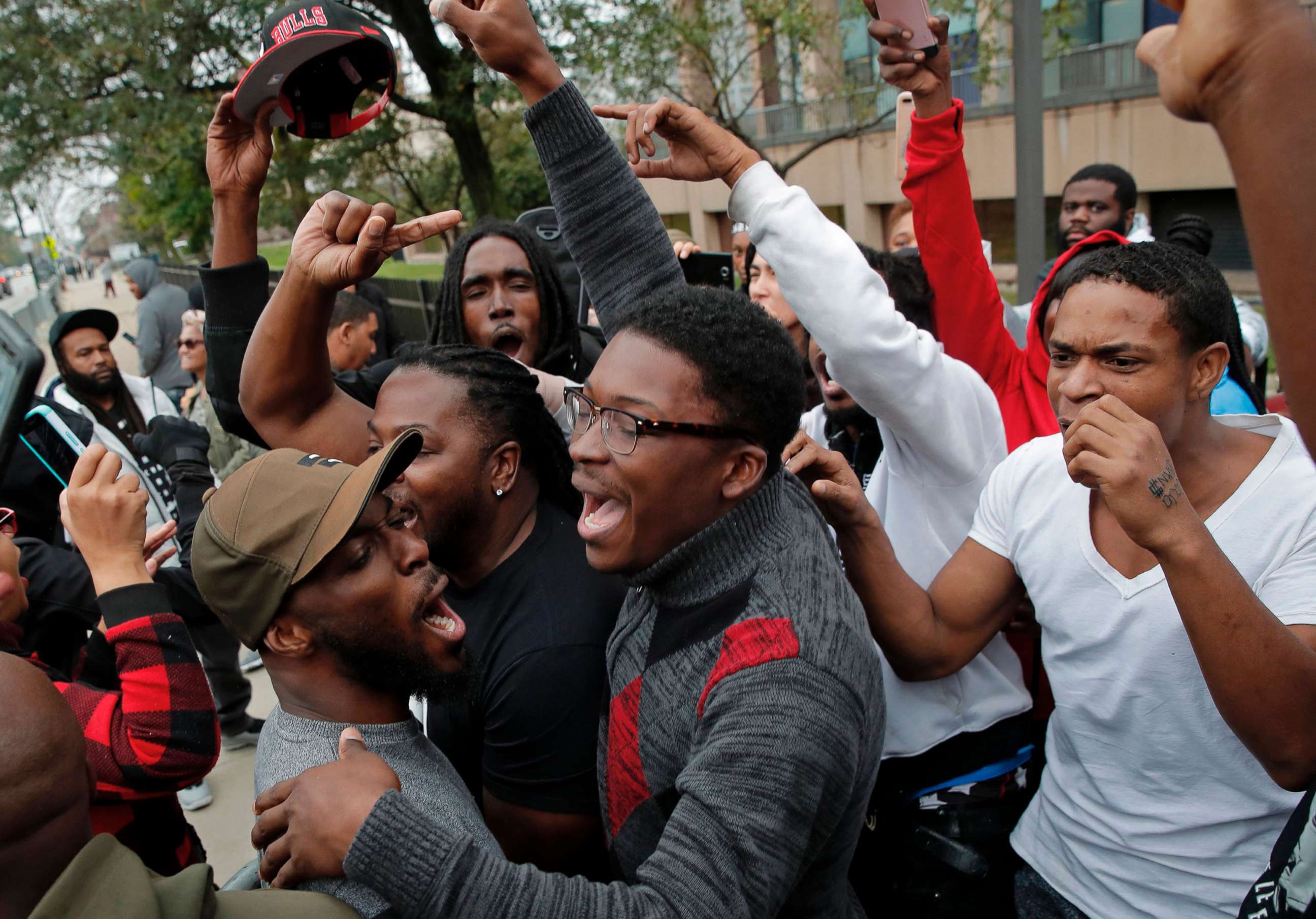 PHOTO: People celebrate the guilty verdict in the murder trial of Chicago police officer Jason Van Dyke outside the Leighton Criminal Court Building in Chicago, Oct. 5, 2018. Van Dyke was found guilty of murder for fatally shooting Laquan McDonald.