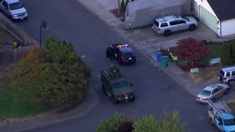 PHOTO: Law enforcement conduct a search in pursuit of three suspects in the fatal shooting of a Clark County, Wash. Deputy Sheriff in Vancouver, B.C., Canada, July 23, 2021.