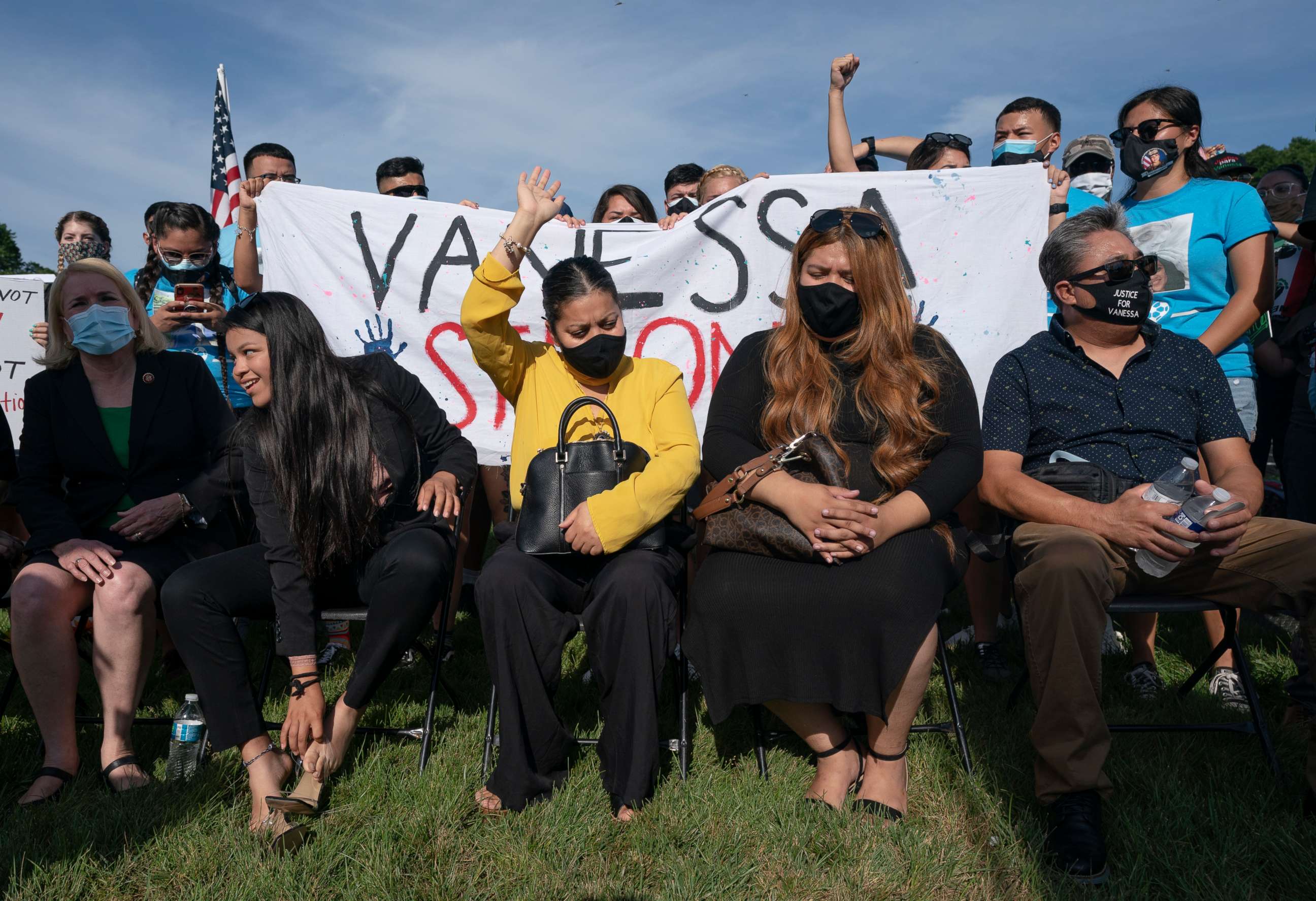 PHOTO: Rep. Sylvia Garcia and the family of Army Spc. Vanessa Guillen sit together surrounded by supporters during a news conference on the National Mall in front of Capitol Hill, July 30, 2020, in Washington.