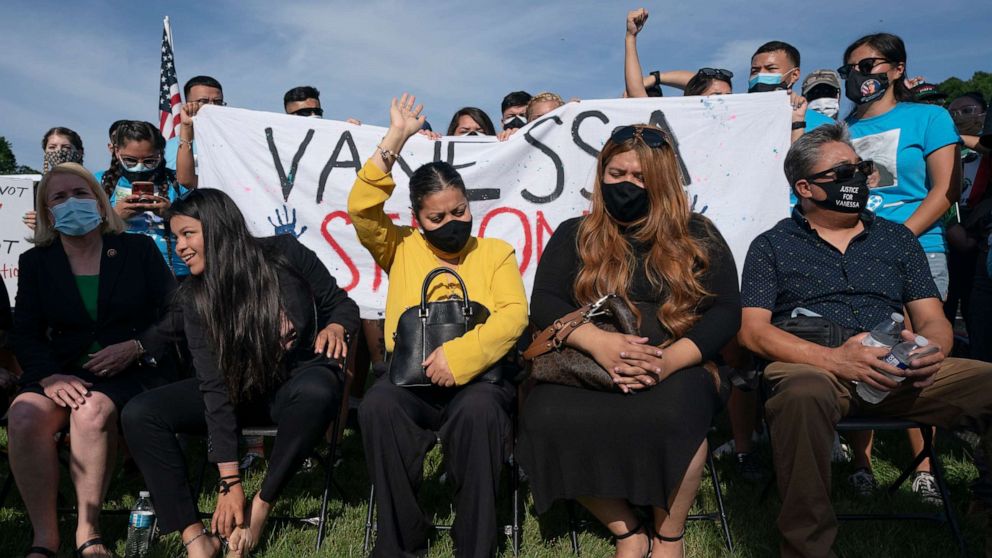 PHOTO: Rep. Sylvia Garcia and the family of Army Spc. Vanessa Guillen sit together surrounded by supporters during a news conference on the National Mall in front of Capitol Hill, July 30, 2020, in Washington.