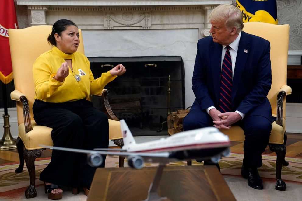 PHOTO: President Donald Trump meets with slain Army Spc. Vanessa Guillen's mother Gloria Guillen in the Oval Office of the White House on July 30, 2020, in Washington.