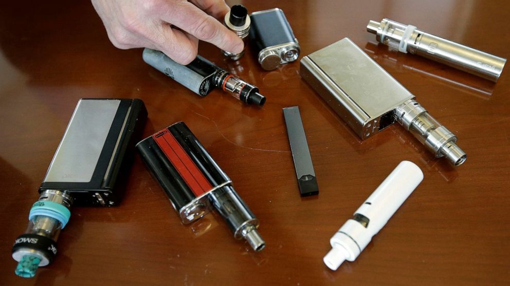 PHOTO: In this April 10, 2018, file photo, a high school principal displays vaping devices that were confiscated from students at the school in Massachusetts.