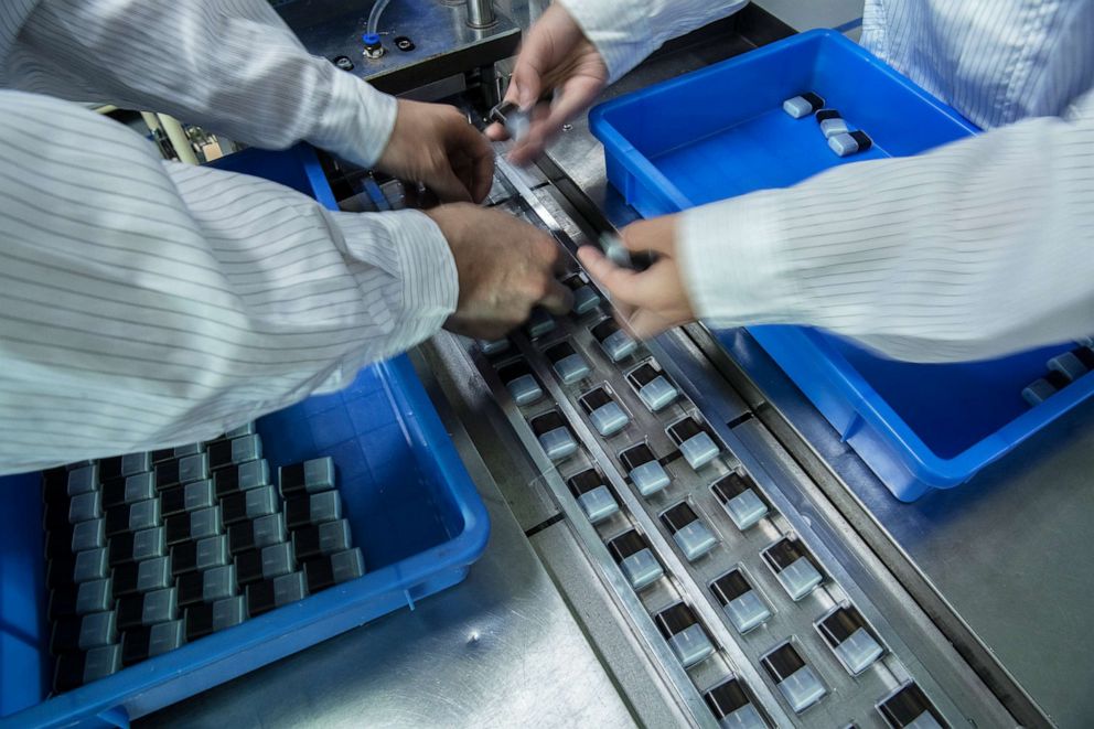 PHOTO: Workers package pods for e-cigarettes by the company Mystlabs on the production line at First Union, one of China's leading manufacturers of vaping products, Sept. 25, 2019 in Shenzhen, China. 