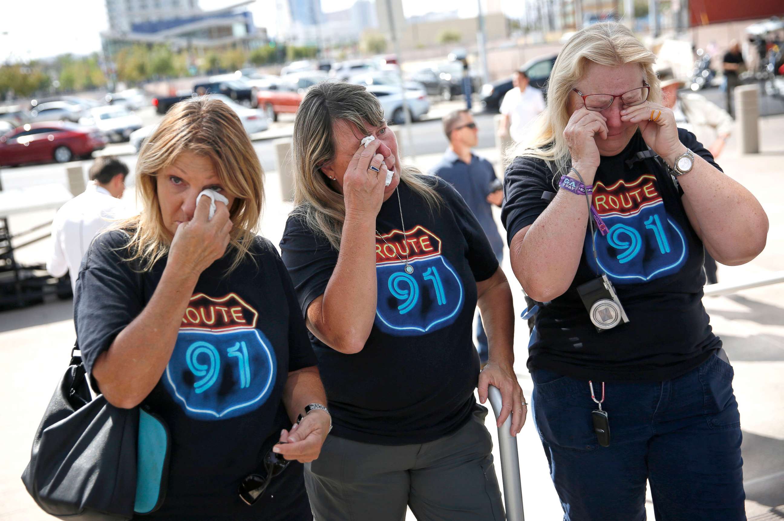 PHOTO: From left, Linda Hazelwood, Michelle Hamel and Jann Blake, all from California, cry as they attend a prayer service on the anniversary of the Oct. 1, 2017 mass shooting, Oct. 1, 2018, in Las Vegas.