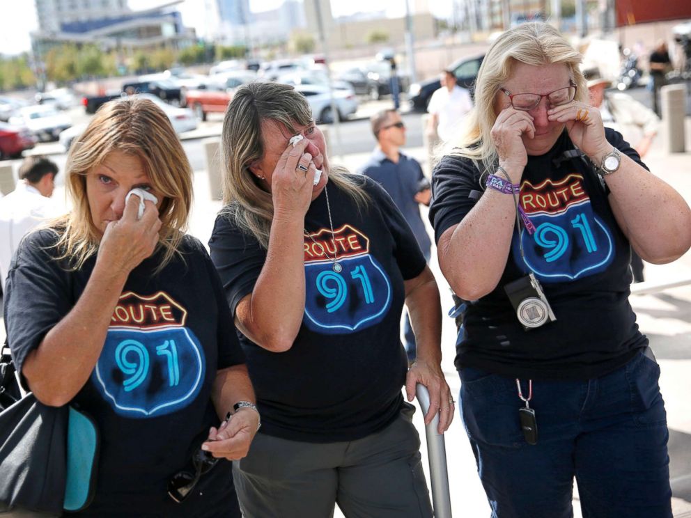 PHOTO: From left, Linda Hazelwood, Michelle Hamel and Jann Blake, all from California, cry as they attend a prayer service on the anniversary of the Oct. 1, 2017 mass shooting, Oct. 1, 2018, in Las Vegas.