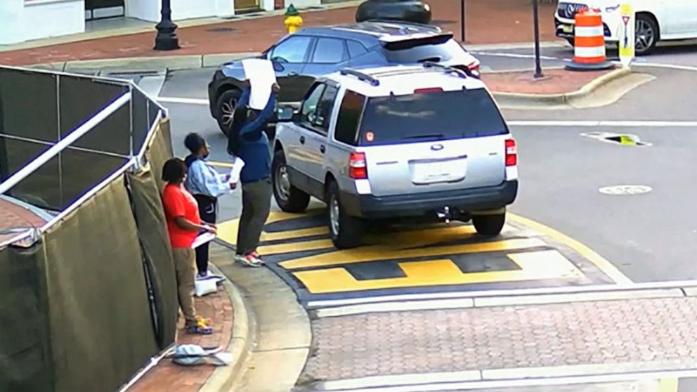 PHOTO: Surveillance video released by police shows an SUV driving around a traffic circle in Fayetteville, N.C., passing close to a group of Black Lives Matter protesters, May 7, 2021.