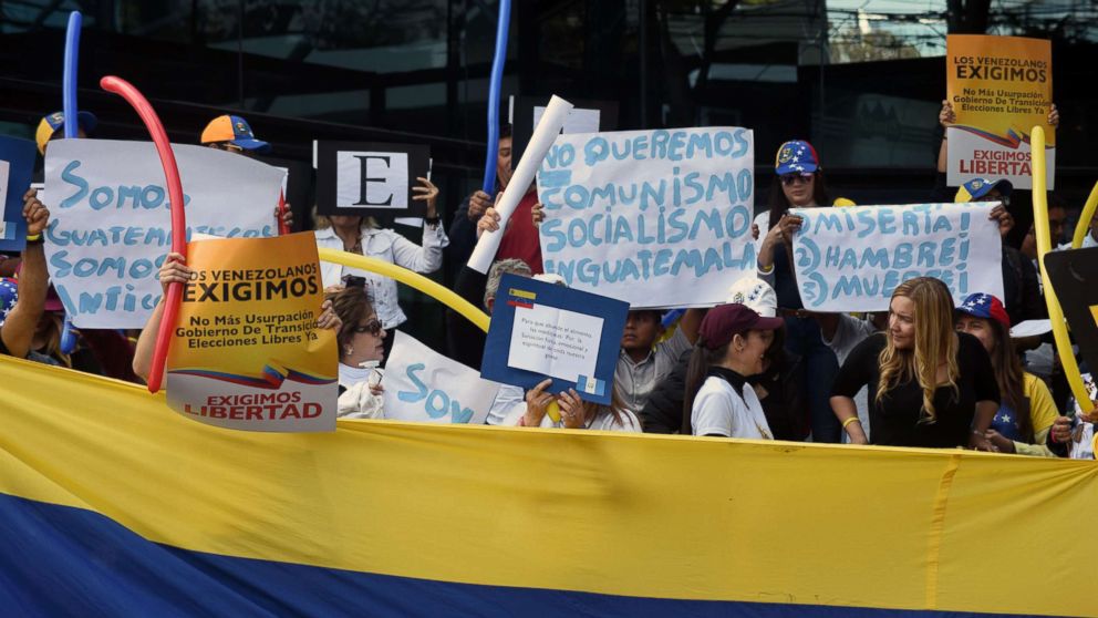 PHOTO: Venezuelans hold a demonstration outside the Venezuelan Embassy in Guatemala City in support of opposition leader Juan Guaido's self-proclamation as acting president of Venezuela, Jan. 23, 2019.