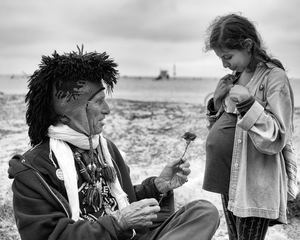 PHOTO: Jingles' Blessing - The older man, who goes by the name of "Jingles," has been preaching for animal rights and a vegan lifestyle for many years from his booth on the Venice Boardwalk.