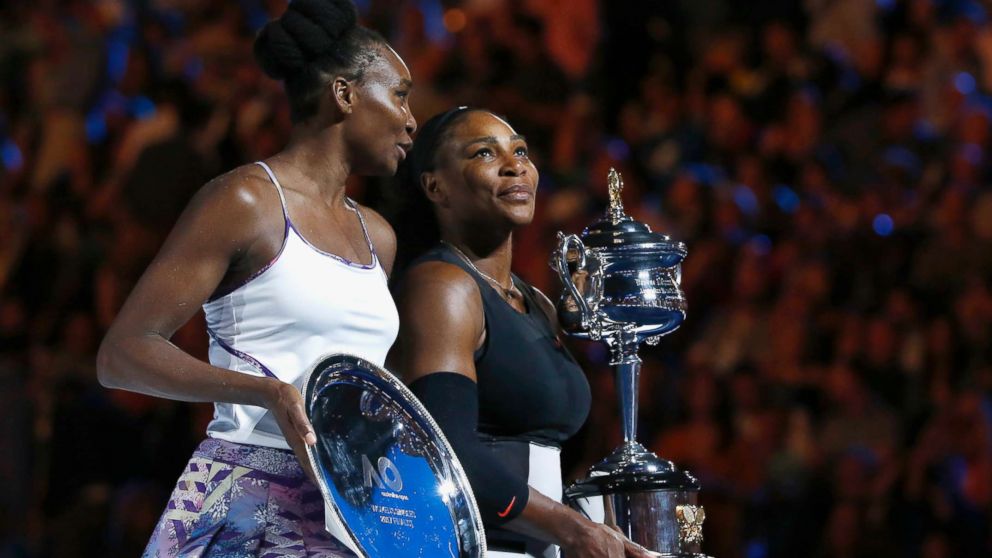 PHOTO: Serena Williams holds her trophy after winning her Women's singles final match against Venus Williams in Melbourne, Australia, Jan. 28, 2017.