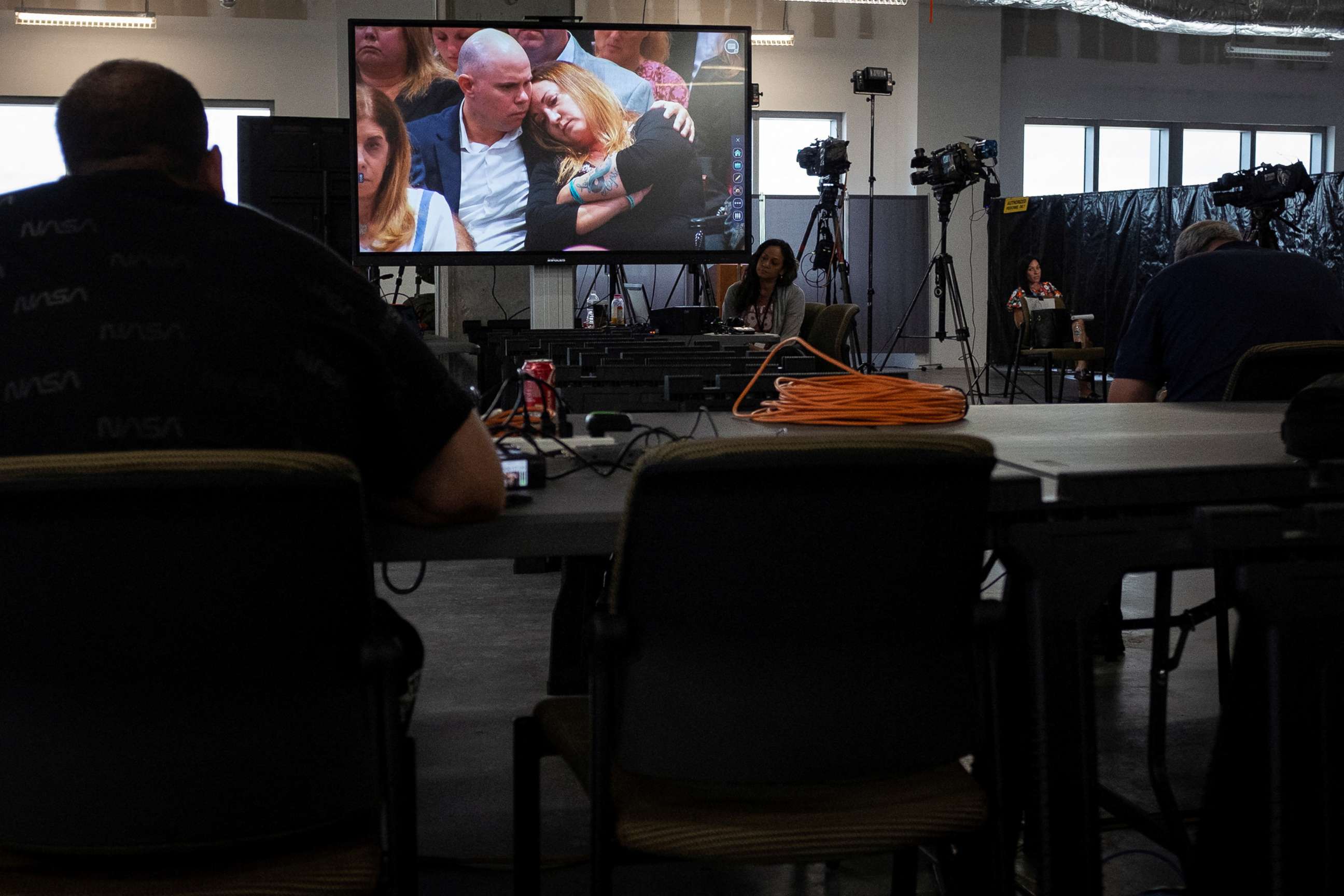 PHOTO:Relatives of MSD High School shooting victims are seen reacting on a TV screen in the media room as the judge reads the jury verdict in the penalty phase of the trial of shooter Nikolas Cruz at the Courthouse in Fort Lauderdale, Fla., Oct. 13, 2022.