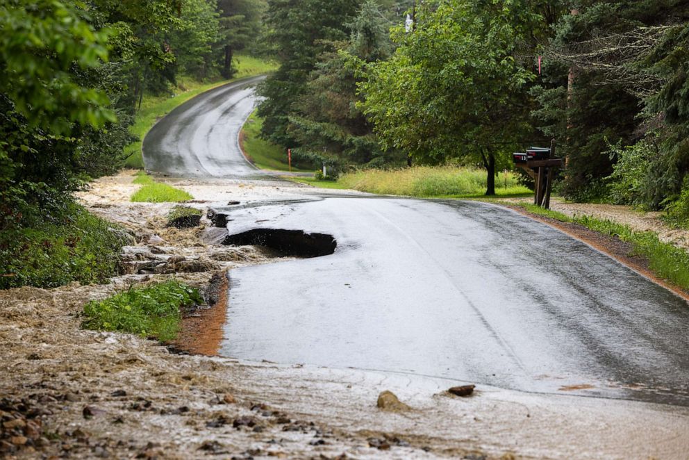 PHOTO: A road is severely damaged by flooding on July 10, 2023 in Windham, Vt.