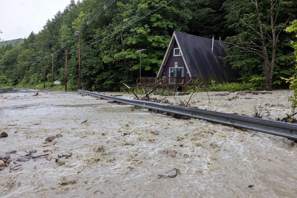 PHOTO: Water floods around a house on Route 11 in Windham, Vermont, on July 10, 2023.