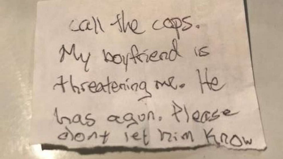 A woman managed to slip her dog's veterinarian a note saying she was being held captive by her armed boyfriend on Friday, May 25, 2018. Police arrested the man at the animal hospital.