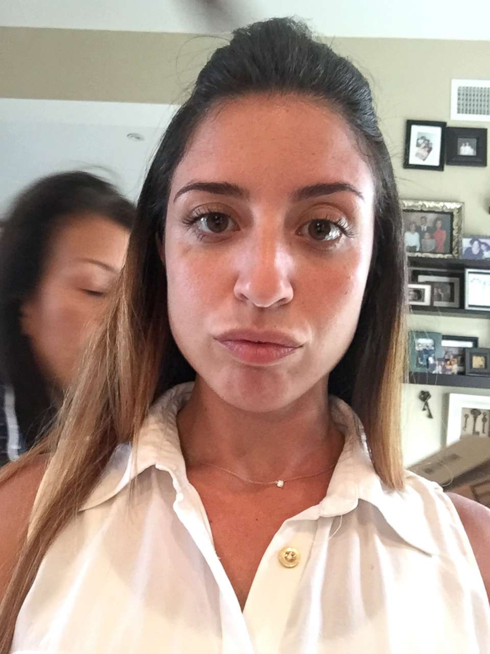 PHOTO: The last photo of Karina Vetrano at her Howard Beach home moments before leaving for a jog, Aug. 2, 2016, with her mother in the background.