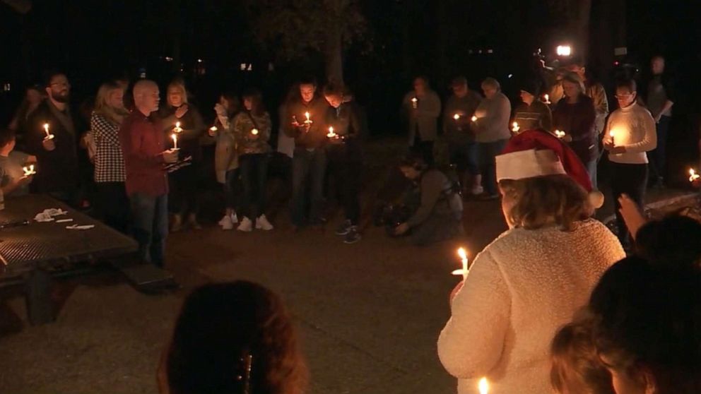 PHOTO: People attend a vigil at Garrison Park in Austin Monday night, Dec. 23, 2019, for Heidi Broussard, whose body was found in Houston.