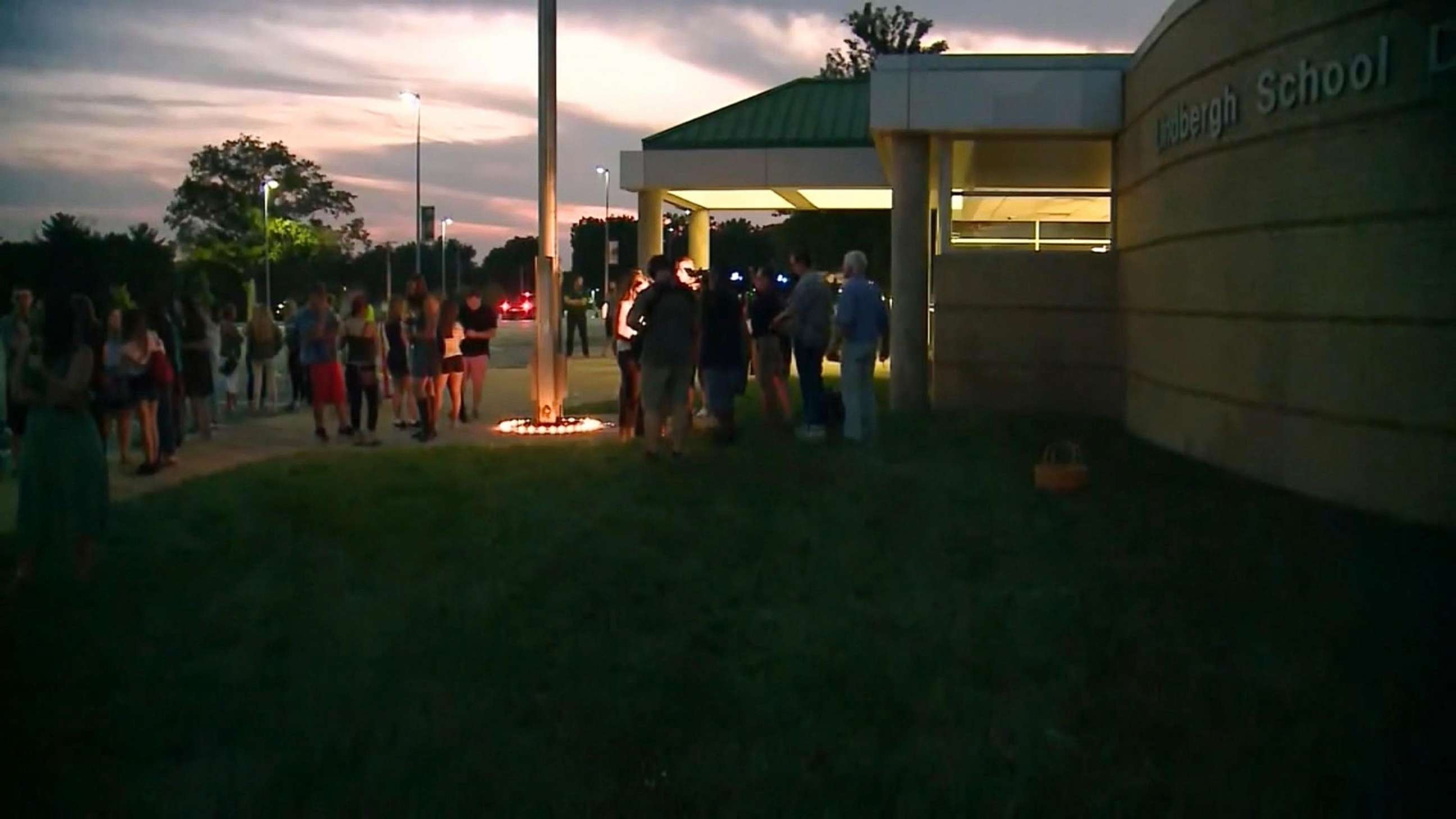 PHOTO: People gather for a vigil for slain Ole Miss student Alexandria "Ally" Kostial at a St. Louis, Missouri high school, July 25, 2019.