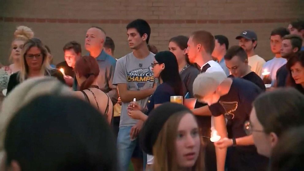 PHOTO: People gather for a vigil for slain Ole Miss student Alexandria "Ally" Kostial at a St. Louis, Missouri high school, July 25, 2019.