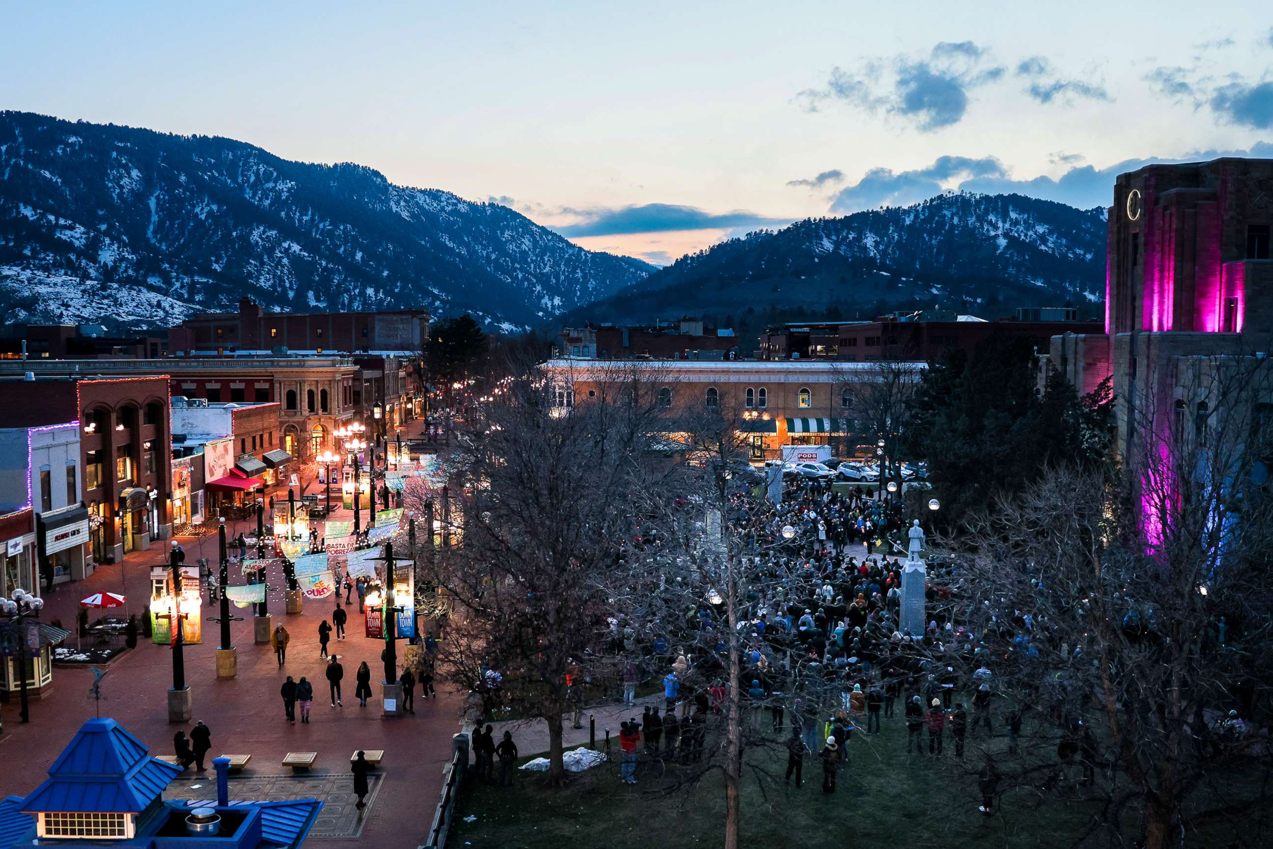 PHOTO: Mourners attend a candlelight vigil outside the Boulder County Courthouse on March 24, 2021 in Boulder, Colo., a few days after a mass shooting at a grocery store that left ten people dead. 