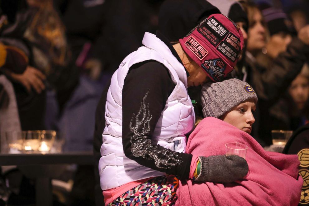 PHOTO: A moment of silence for Jayme Closs during a gathering at the Barron High School football stadium, Oct. 22, 2018.