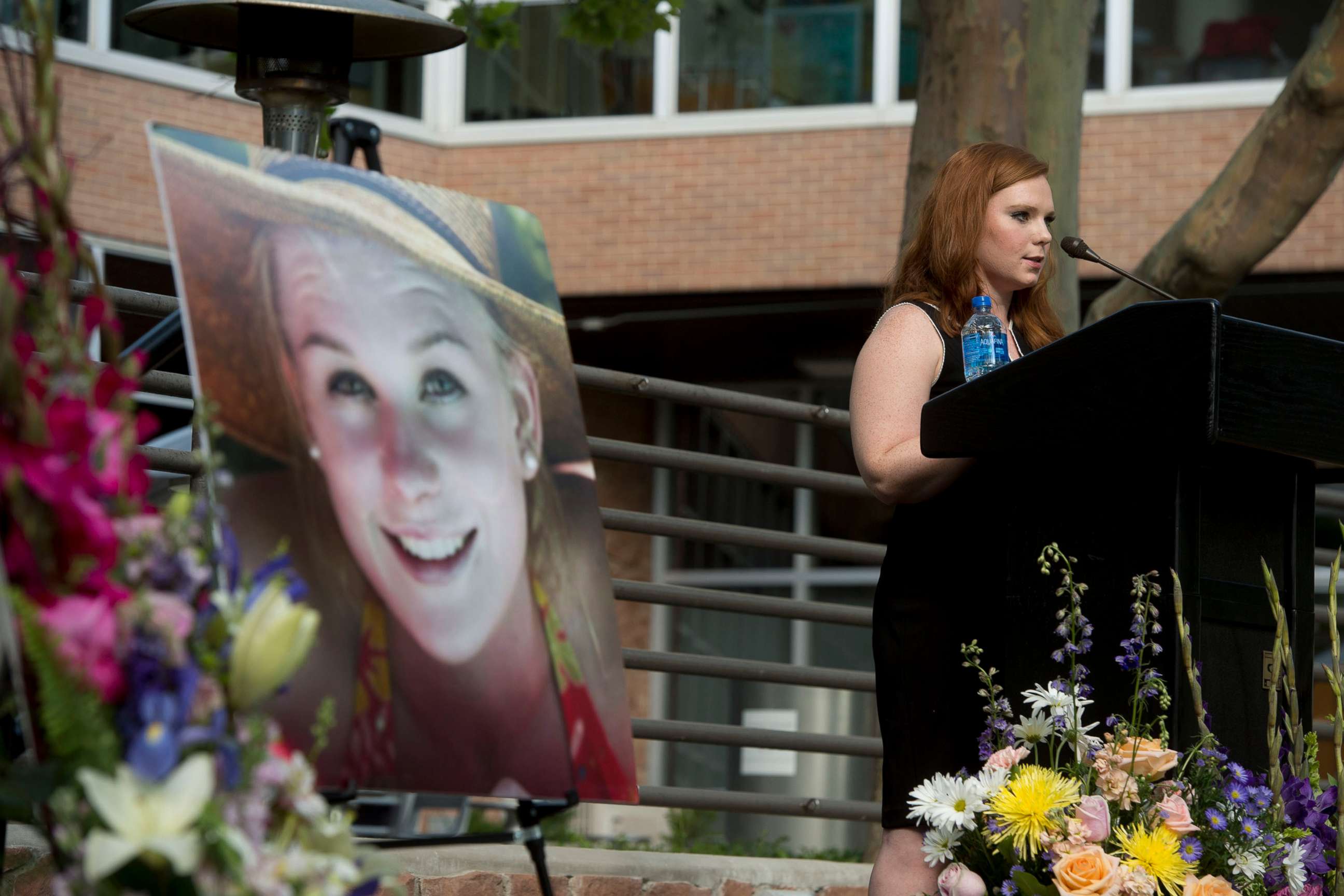PHOTO: In this July 1, 2019, file photo, Ashley Fine speaks during a vigil for Mackenzie Lueck at the university in Salt Lake City.