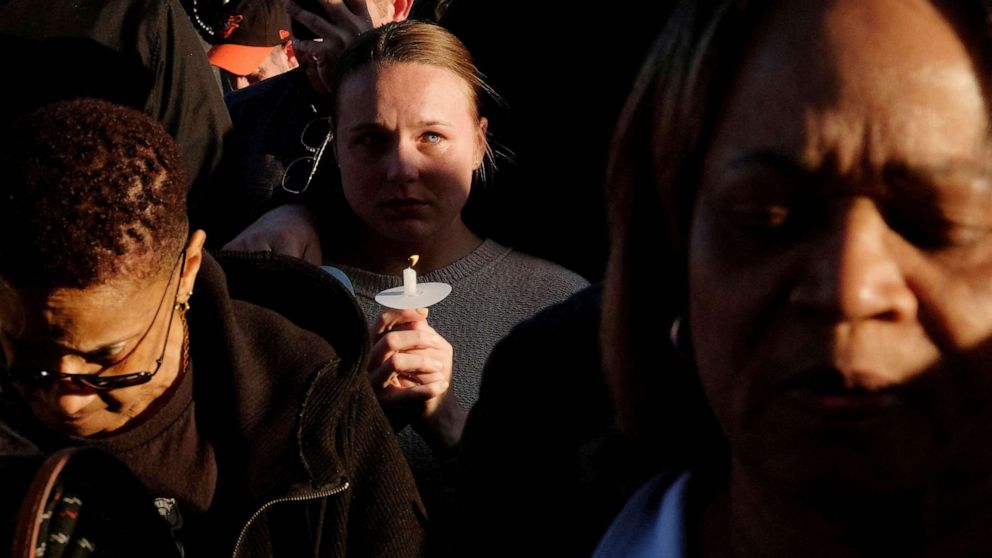 PHOTO: People attend a vigil after a deadly shooting at the Covenant School in Nashville, Tenn., March 29, 2023.