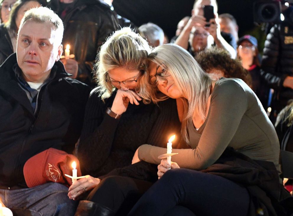 PHOTO: Family members and friends gather for a candlelight vigil memorial at Mohawk Valley Gateway Overlook Pedestrian Bridge in Amsterdam, N.Y., Oct. 8, 2018.