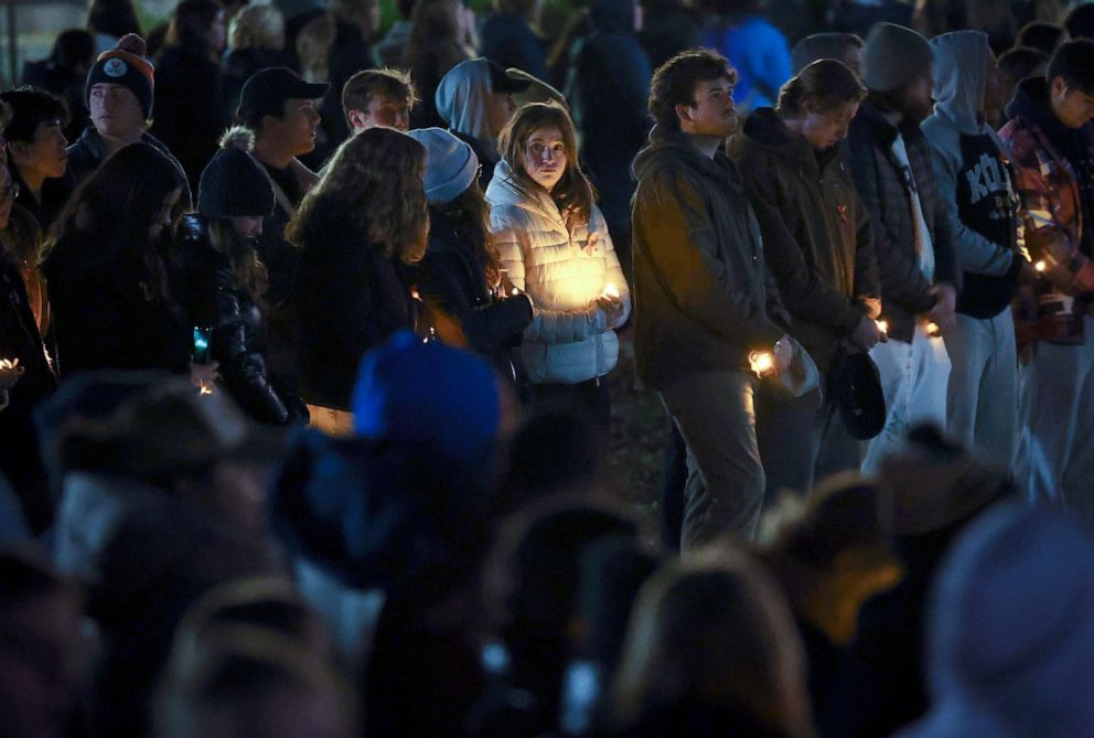 PHOTO: Members of the University of Virginia community attend a candlelight vigil on the South Lawn for the victims of a shooting overnight at the university, on Nov. 14, 2022 in Charlottesville, Va.