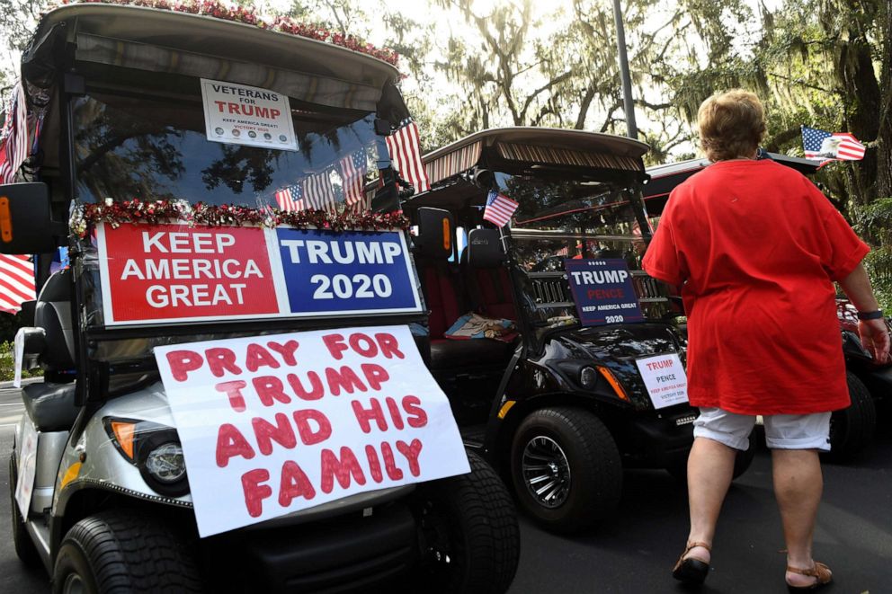 PHOTO: Residents queue up to participate in a golf cart parade in support of the re-election of President Donald Trump, Oct. 3, 2020, in The Villages, Florida, a retirement community north of Orlando.