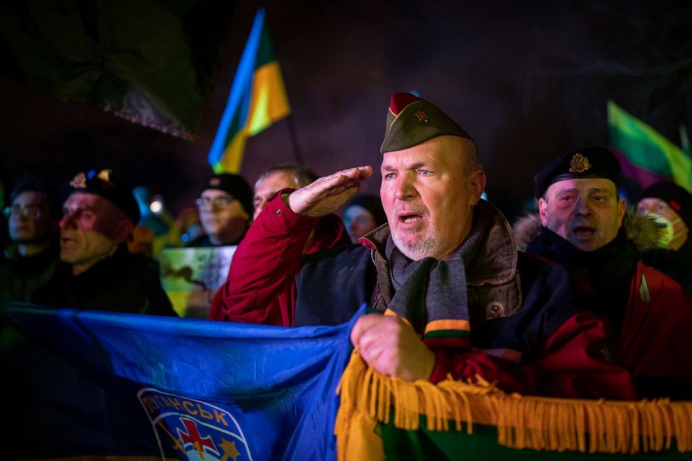 PHOTO: People take part in a protest against Russian invasion of Ukraine, in Vilnius, Lithuania, Feb. 24, 2022.