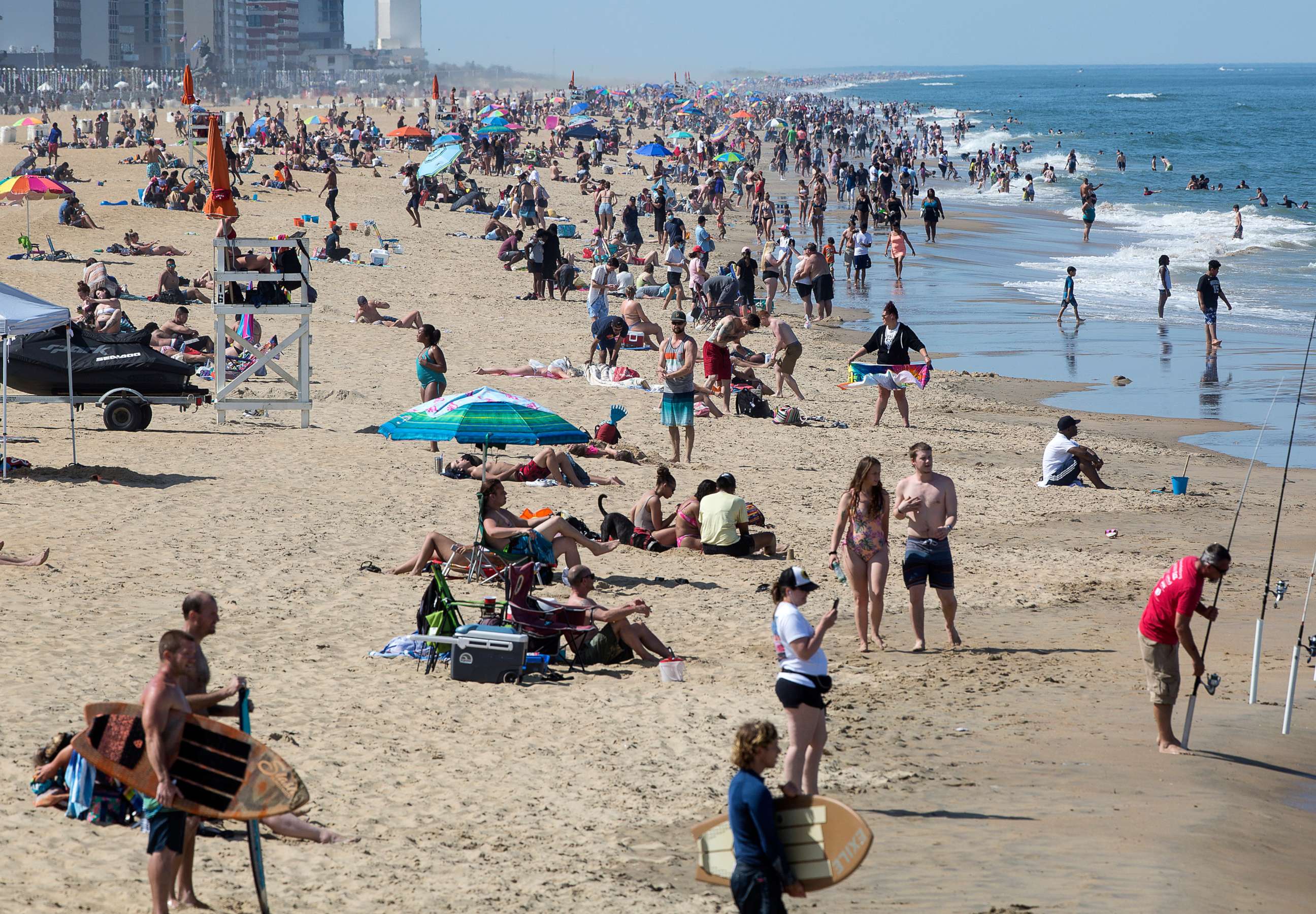 PHOTO: Warm weather draws crowds to the oceanfront, May 16, 2020, in Virginia Beach, Va.