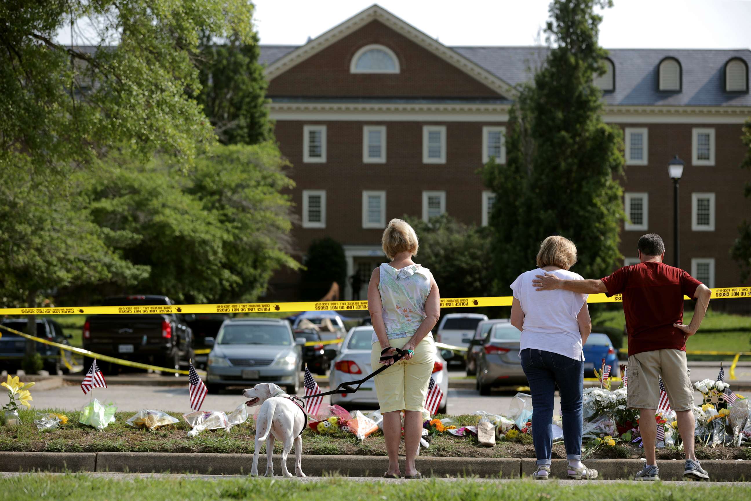 PHOTO: People stop to pay their respects to those killed in a mass shooting at a makeshift memorial outside the City of Virginia Beach Operations Building, June 2, 2019, in Virginia Beach, Vir.