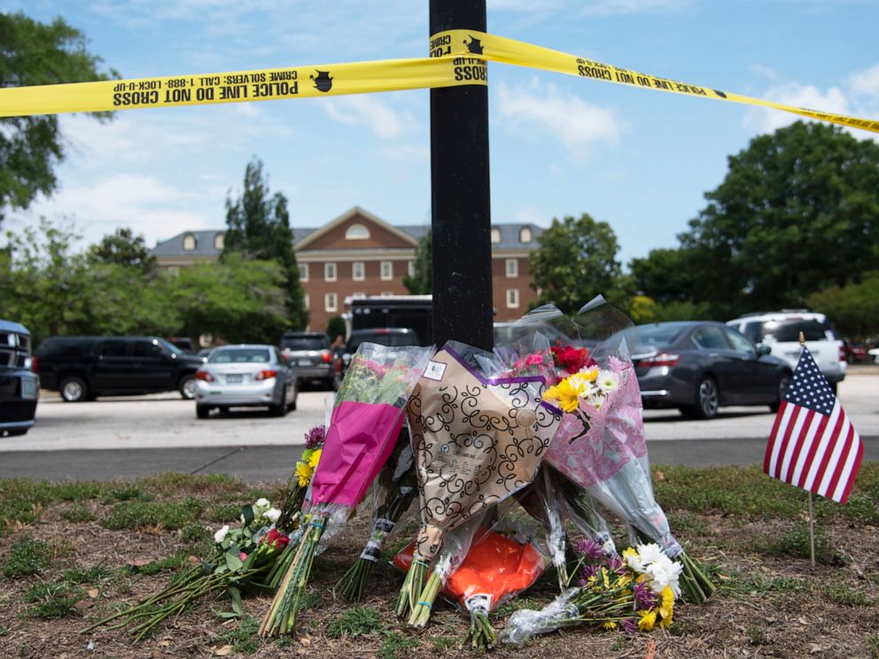 PHOTO: Flowers sit on the ground outside a municipal building where a gunman killed 12 in Virginia Beach, Va., June 1, 2019.