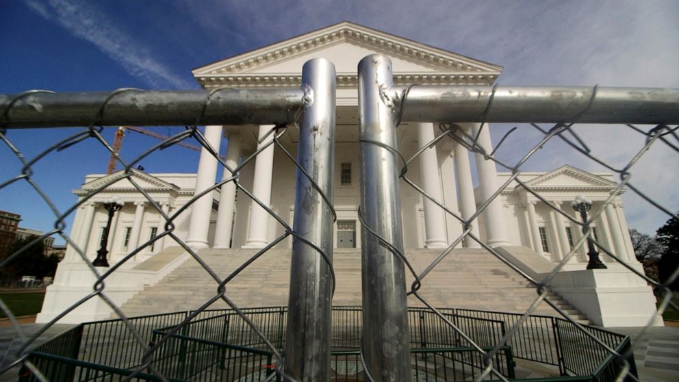 PHOTO: The Virginia state Capitol building is surrounded by fencing, Jan. 16, 2020 in Richmond, Va., in preparation for Monday's rally by gun rights advocates.