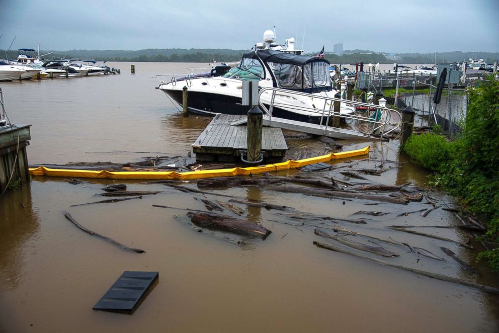 PHOTO: A dock at the City Marina in Alexandria, Va., floods after days of raining, July 24, 2018.