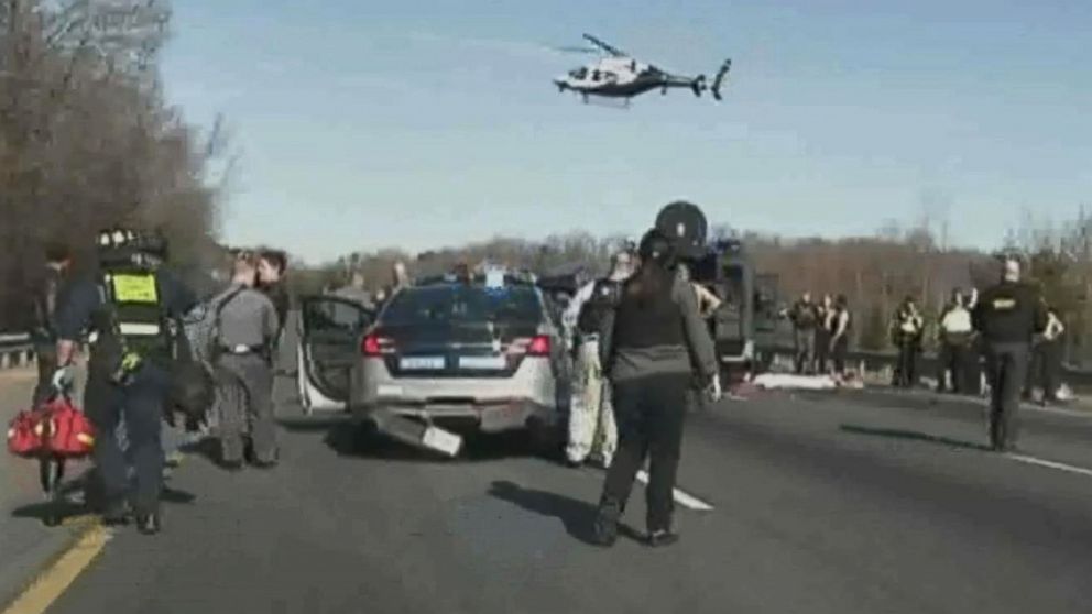 PHOTO: Multiple officers responded to the scene where the murder suspect flipped the SUV he was driving in Virginia, Dec. 28, 2017. The suspect was flown to a nearby hospital.