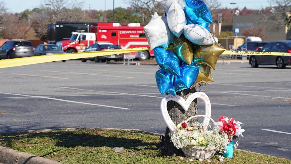 PHOTO: A memorial is seen in the parking lot after a mass shooting at a Walmart in Chesapeake, Virginia, Nov. 23, 2022.